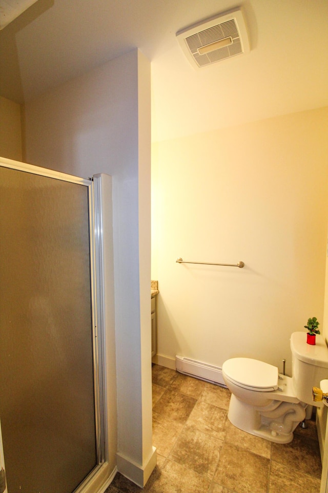 135 Vernon St Unit 4E, Bethel, ME 04217 - bathroom with a baseboard radiator, a stall shower, and vanity