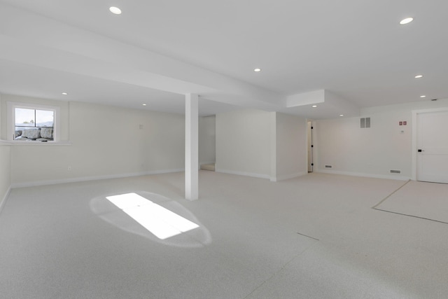 basement with light colored carpet