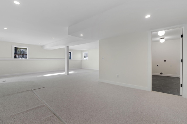 basement featuring carpet flooring