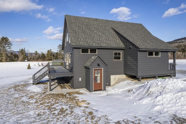 view of front property featuring a wooden deck