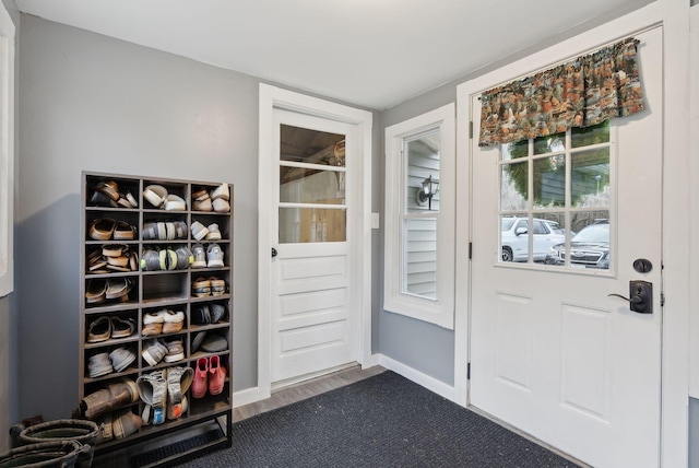 doorway featuring dark hardwood / wood-style floors