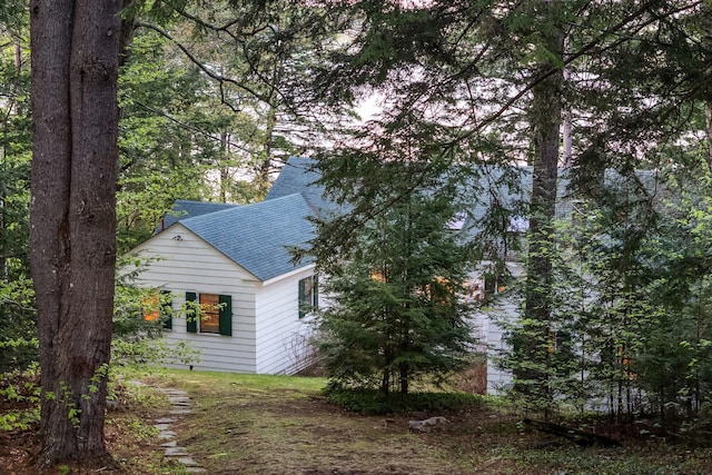 137 Birch Ln, Belgrade, ME 04917 - view of home's exterior featuring roof with shingles