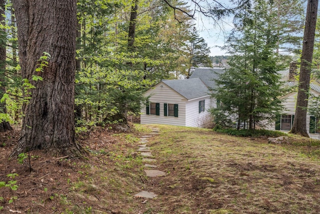 137 Birch Ln, Belgrade, ME 04917 - view of home's exterior with a shingled roof
