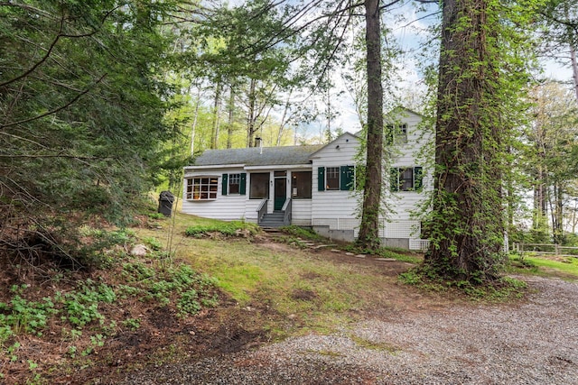 137 Birch Ln, Belgrade, ME 04917 - single story home featuring crawl space, entry steps, a chimney, and a sunroom