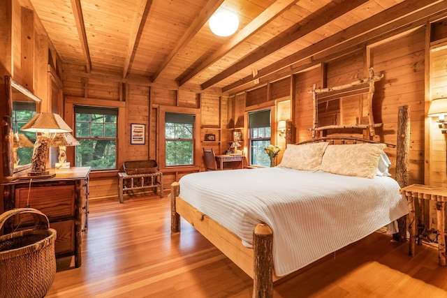 137 Birch Ln, Belgrade, ME 04917 - bedroom featuring wood walls, wood ceiling with exposed beams, and wood finished floors
