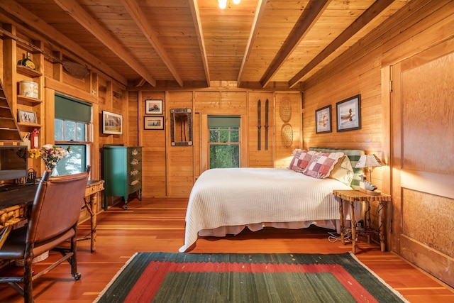 137 Birch Ln, Belgrade, ME 04917 - bedroom featuring wood walls, wood finished floors, and wooden ceiling with exposed beams