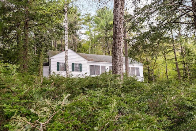 137 Birch Ln, Belgrade, ME 04917 - view of side of property with a shingled roof