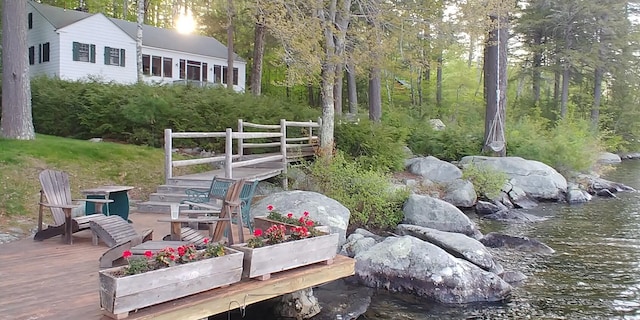 137 Birch Ln, Belgrade, ME 04917 - view of yard featuring a deck with water view