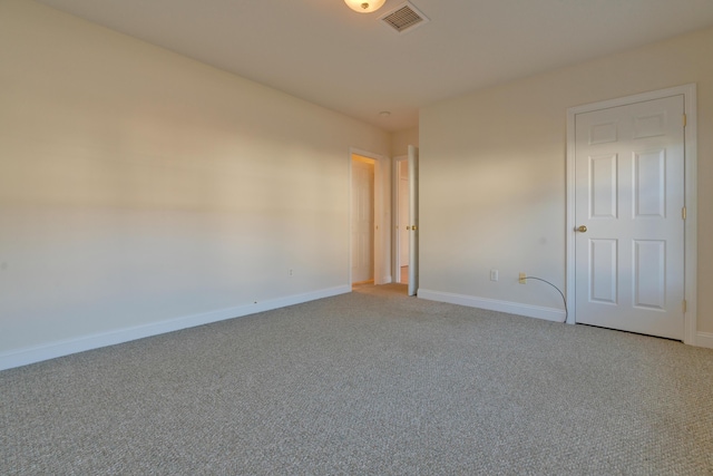 unfurnished room with carpet flooring