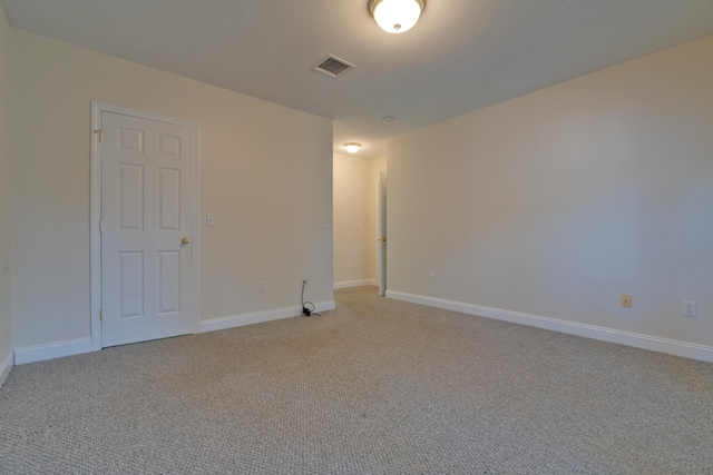 empty room with light carpet