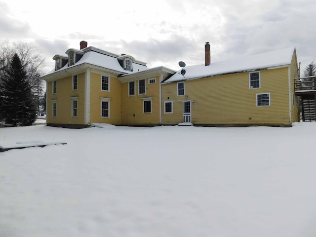 view of snow covered property