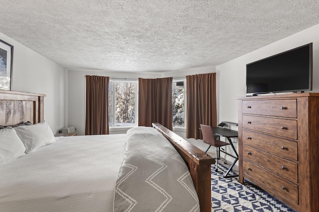 bedroom featuring a textured ceiling