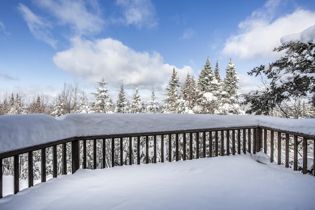 view of snow covered deck