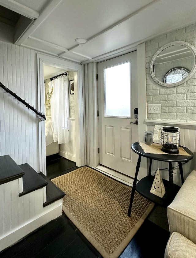 foyer featuring dark wood-type flooring