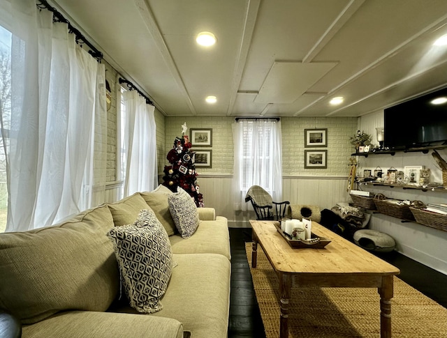 living room featuring wooden walls