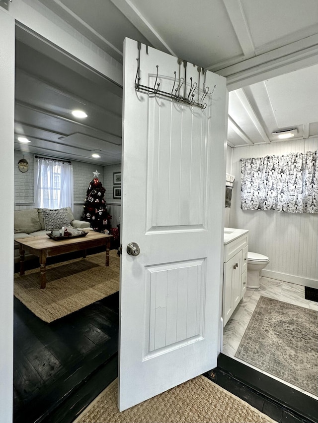 bathroom with vanity and toilet