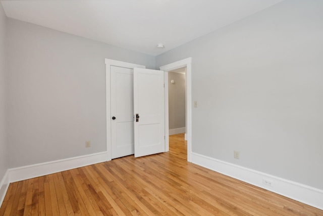 unfurnished bedroom with light hardwood / wood-style floors