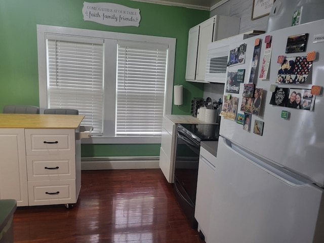 kitchen featuring black range with electric stovetop, white cabinetry, dark hardwood / wood-style floors, white refrigerator, and crown molding