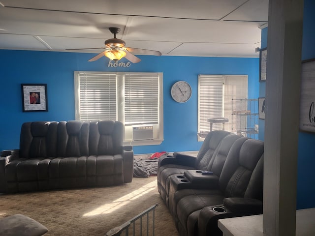 carpeted living room with cooling unit and ceiling fan