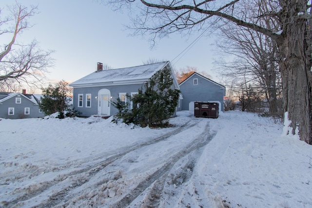 view of snow covered house