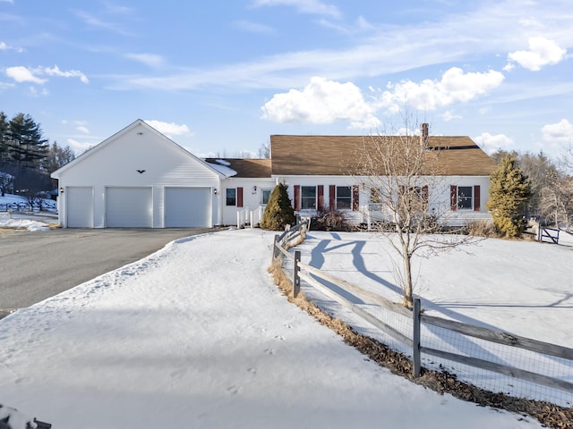 single story home featuring a garage