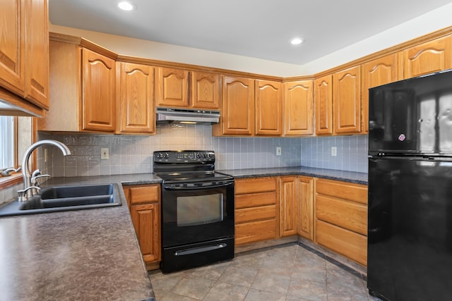 kitchen with tasteful backsplash, light tile patterned floors, sink, and black appliances