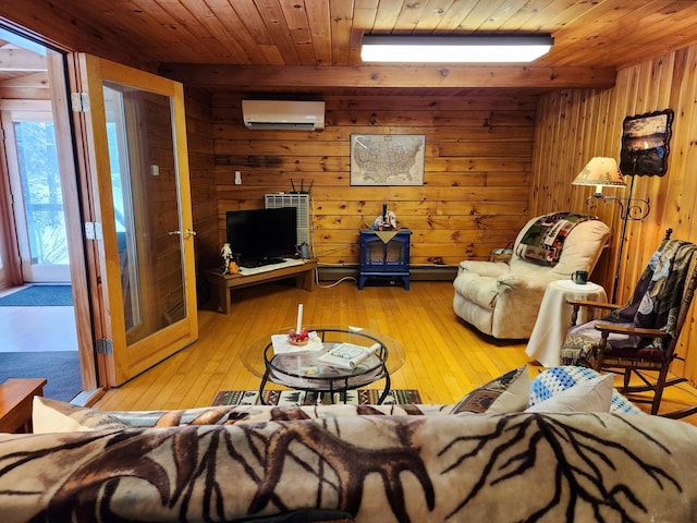 living room featuring wooden walls, light wood-type flooring, a wall unit AC, and wooden ceiling