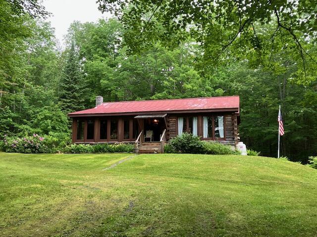 view of front of property with a front lawn