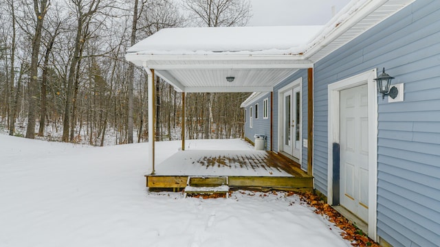 view of snow covered deck