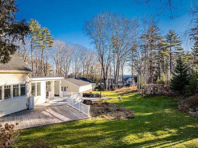 view of yard featuring a wooden deck