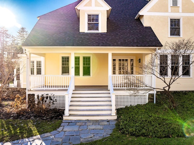 view of front of property featuring covered porch