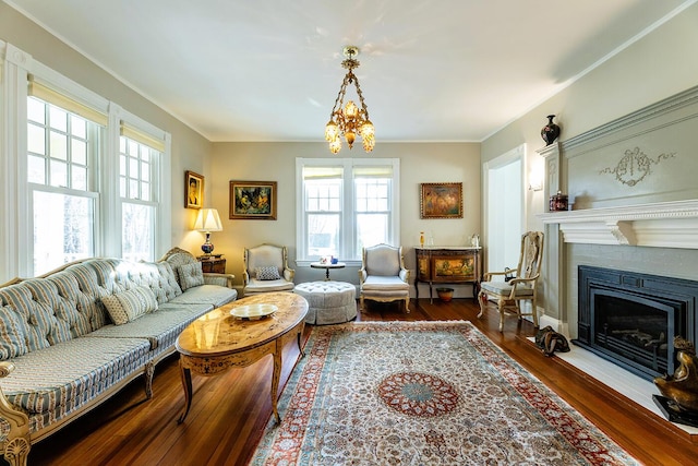 living room with ornamental molding and hardwood / wood-style flooring