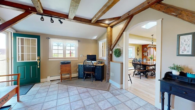 office space featuring vaulted ceiling with beams, light hardwood / wood-style flooring, and a baseboard radiator