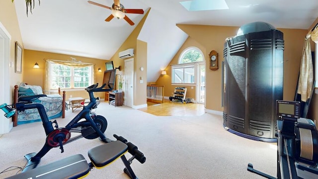 workout room with a wall unit AC, plenty of natural light, lofted ceiling, and ceiling fan