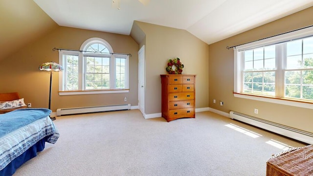 carpeted bedroom featuring lofted ceiling, baseboard heating, and multiple windows