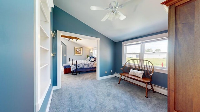 sitting room featuring ceiling fan, vaulted ceiling, light carpet, and a baseboard radiator