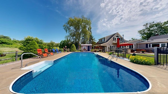 view of pool featuring a patio area