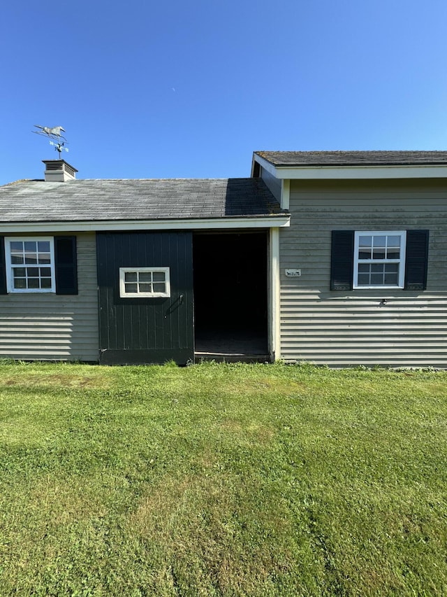 exterior space with a lawn