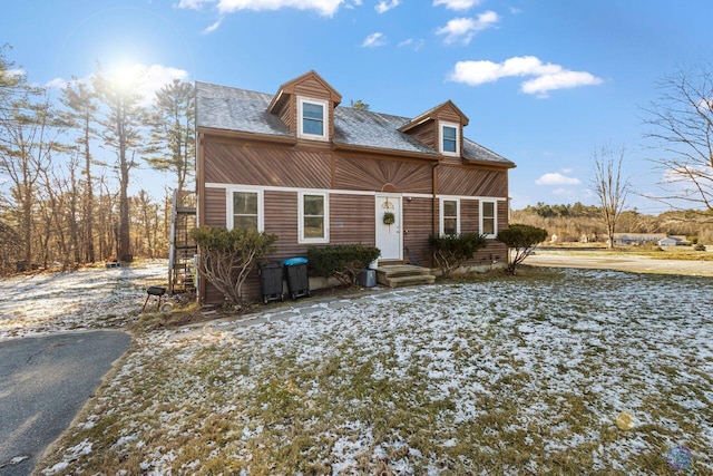 view of new england style home