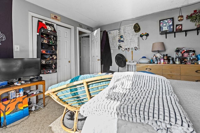 carpeted bedroom featuring a closet