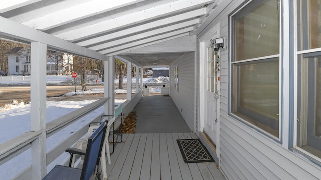 view of snow covered deck