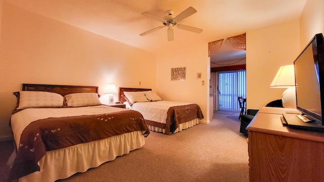 bedroom featuring light carpet and ceiling fan