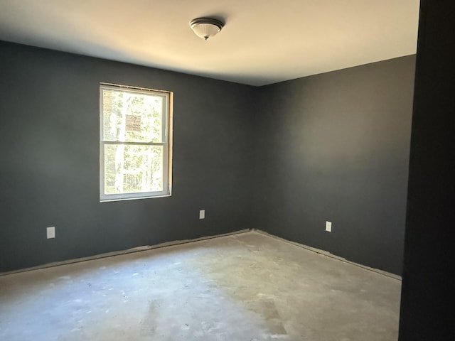 199 Bert Berry Rd, Embden, ME 04958 - unfurnished room with concrete floors and baseboards