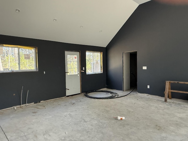 199 Bert Berry Rd, Embden, ME 04958 - entryway with healthy amount of natural light and high vaulted ceiling