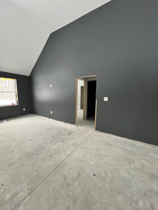 199 Bert Berry Rd, Embden, ME 04958 - empty room with vaulted ceiling