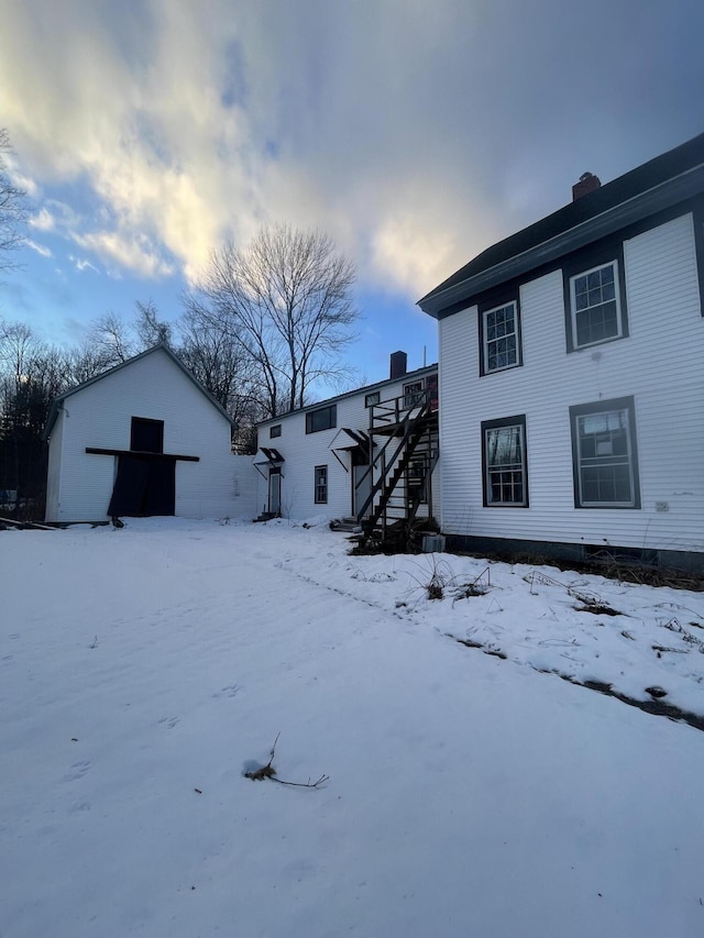 view of yard layered in snow