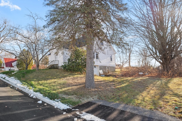 view of yard featuring a garage