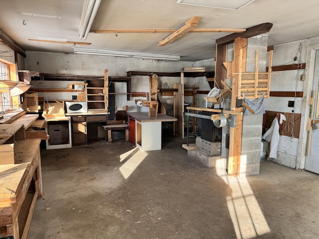 basement with a workshop area