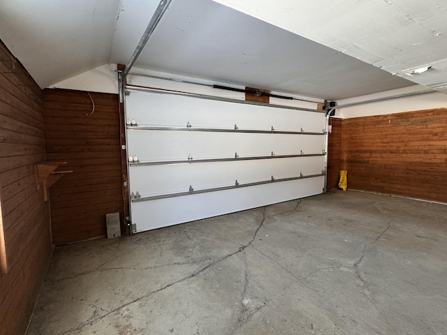 garage with wood walls