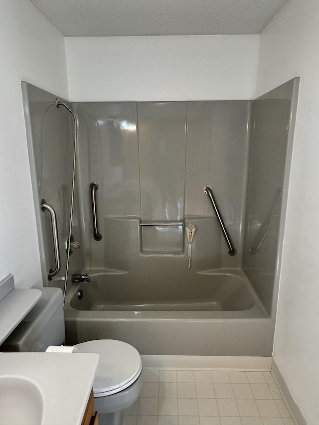 full bathroom with tile patterned floors, toilet, vanity, and tub / shower combination